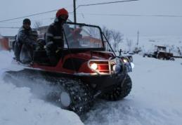 Bolnav adus cu ATV-ul pe şenile la ambulanţă 
