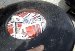 Țigări ascunse în butelia de GPL a unei mașini