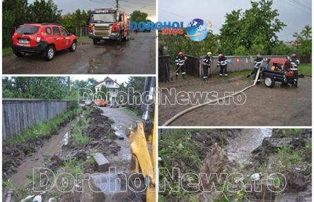 Gospodării și beciuri inundate după o ploaie torențială la Dorohoi: Intervenție în forță a pompierilor - FOTO