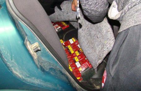 Auto „tunat” cu mii de ţigarete de contrabandă - FOTO