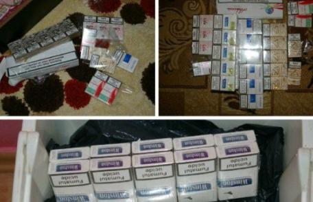 Ţigarete confiscate de poliţişti, în urma unor percheziţii domiciliare