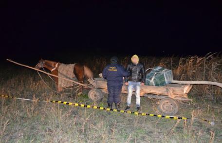 Prins cu căruţa plină cu ţigări de contrabandă - FOTO