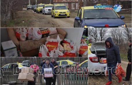 Gest emoționant al unui grup de dorohoieni, în prag de Crăciun: Zâmbete aduse pe chipurile unei familii cu șapte copii - FOTO