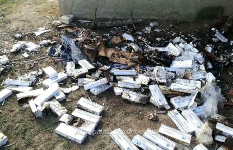 Botoșănean prins de polițiștii de frontieră în timp ce incendia țigări de contrabandă - FOTO