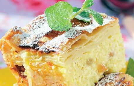 Budincă de brânză dulce cu gris și stafide la cuptor