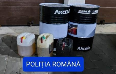 Percheziții la trei locuințe din județ. Polițiștii au descoperit 1.260 de litri de motorină furată - FOTO