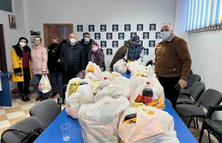 Fapte bune de Crăciun! Pachete distribuite de membrii PNL Dorohoi pentru mai multe familii - FOTO