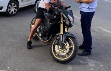 Motocicletă cu numere false depistată în trafic