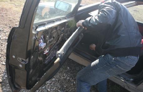 Portiere dublate cu ţigări de contrabandă