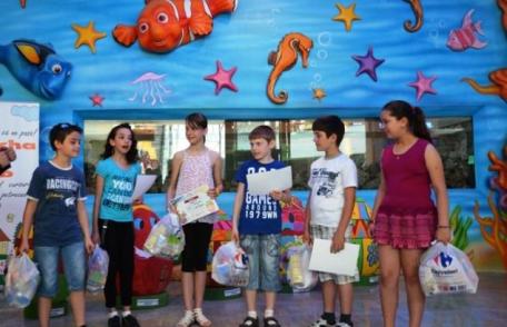 S-a încheiat campania „Uvertura Mall îți aduce în oraș cel mai darnic iepuraș” Vezi cine pleacă la Disneyland - FOTO