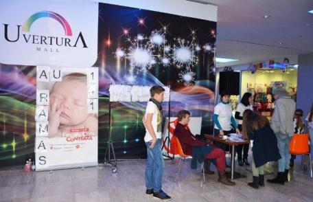 Organizaţia Salvaţi copiii şi Uvertura Mall