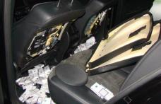 Peste 9.000 de ţigări de contrabandă descoperite într-un autoturism de lux - FOTO