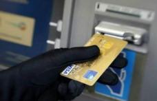 Doi români, reținuți de DIICOT pentru furt din ATM-uri