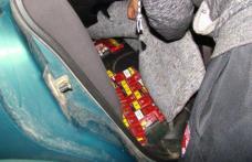 Auto „tunat” cu mii de ţigarete de contrabandă - FOTO