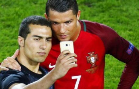 Amendă de la UEFA după selfie-ul făcut de Ronaldo cu un suporter. Motivul...