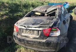 Accident la ieșirea din Dorohoi! Tânăr rănit după ce un BMW s-a izbit într-un mal de pământ și s-a răsturnat - FOTO