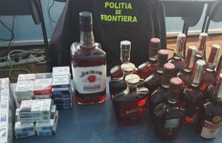 Alcool și țigări de contrabandă, depistate de poliţiştii de frontieră - FOTO
