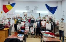 De Moș Nicolae, Primarul le-a oferit daruri copiilor ibăneșteni - FOTO