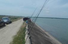 Dosare penale și unelte de pescuit confiscate în zona Lacului de acumulare Stânca Costești