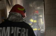 Incendiu izbucnit într-o garsonieră din Botoșani din cauza unei lumânări lăsate aprinse - FOTO