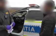 Flagrant la Botoșani: Un tânăr a fost înregistrat cu bodycam în timp ce încerca să mituiască un polițist