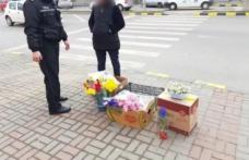 Bătaie cu flori și ghivece în plină stradă. Jandarmii i-au amendat pe vânzătorii ambulanți cu 1600 lei
