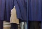 insotitor in cabina de vot