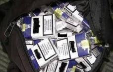 Minor prins de jandarmi în timp ce transporta țigări de contrabandă