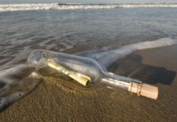 INEDIT: A aruncat o sticlă cu o scrisoare în mare. După 17 luni a primit răspuns