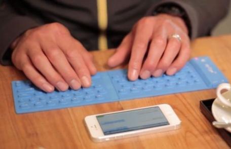 NOU ! S-a inventat tastatura pe care o ţii în buzunar şi o conectezi la iPhone