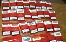 Căruțaș cercetat de polițiști pentru transport de țigări de contrabandă